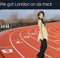 a woman standing on a track with the caption we got london da track