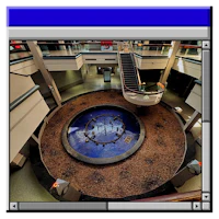 an image of a circular fountain in a building